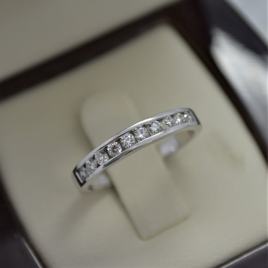 channel set diamond ring in white gold