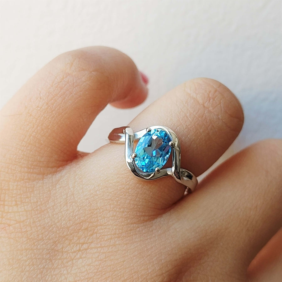oval swiss blue topaz ring