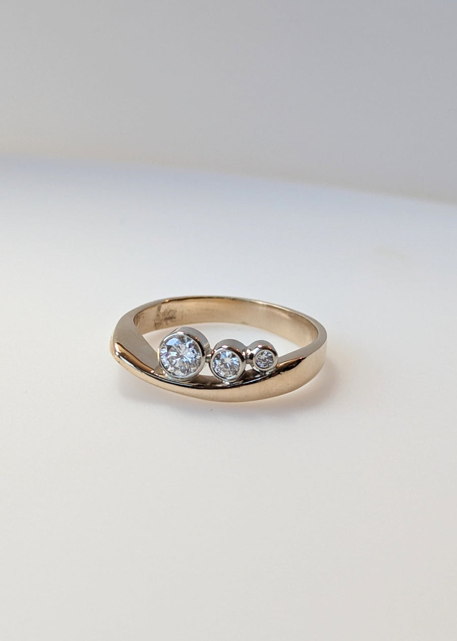 Graduated Bezel Diamond Ring