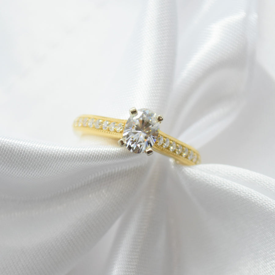 yellow gold oval moissanite ring