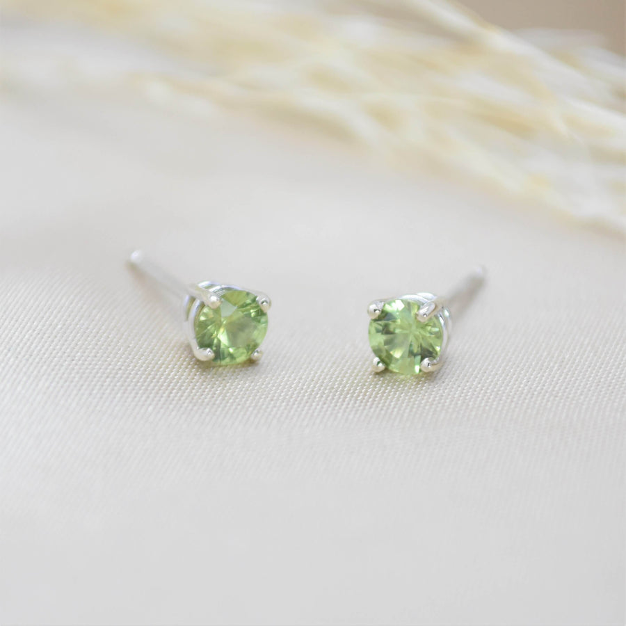 light green sapphire studs