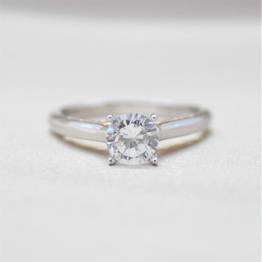 two toned solitaire diamond ring